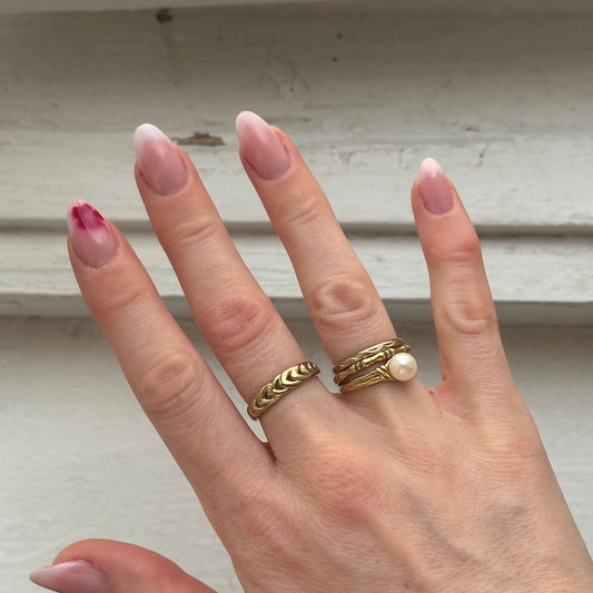 Drei Ringe an Hand 